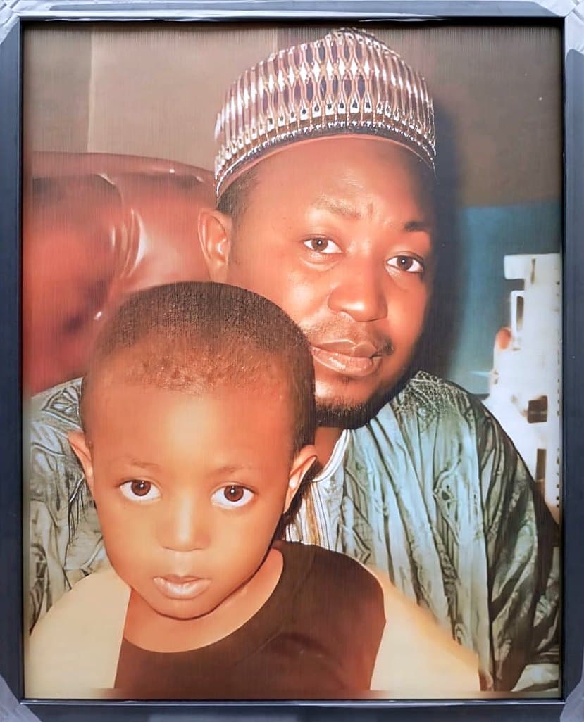 Father and son, 16×20 in black frame