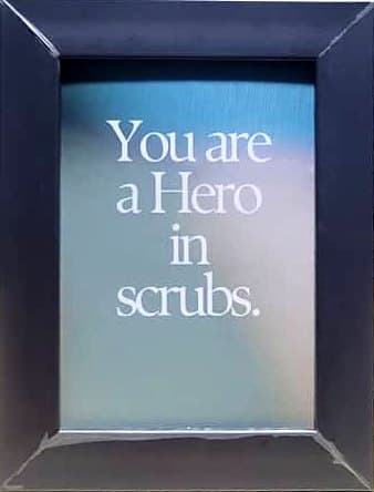 Hero in scrubs, 8×10 in silver frame